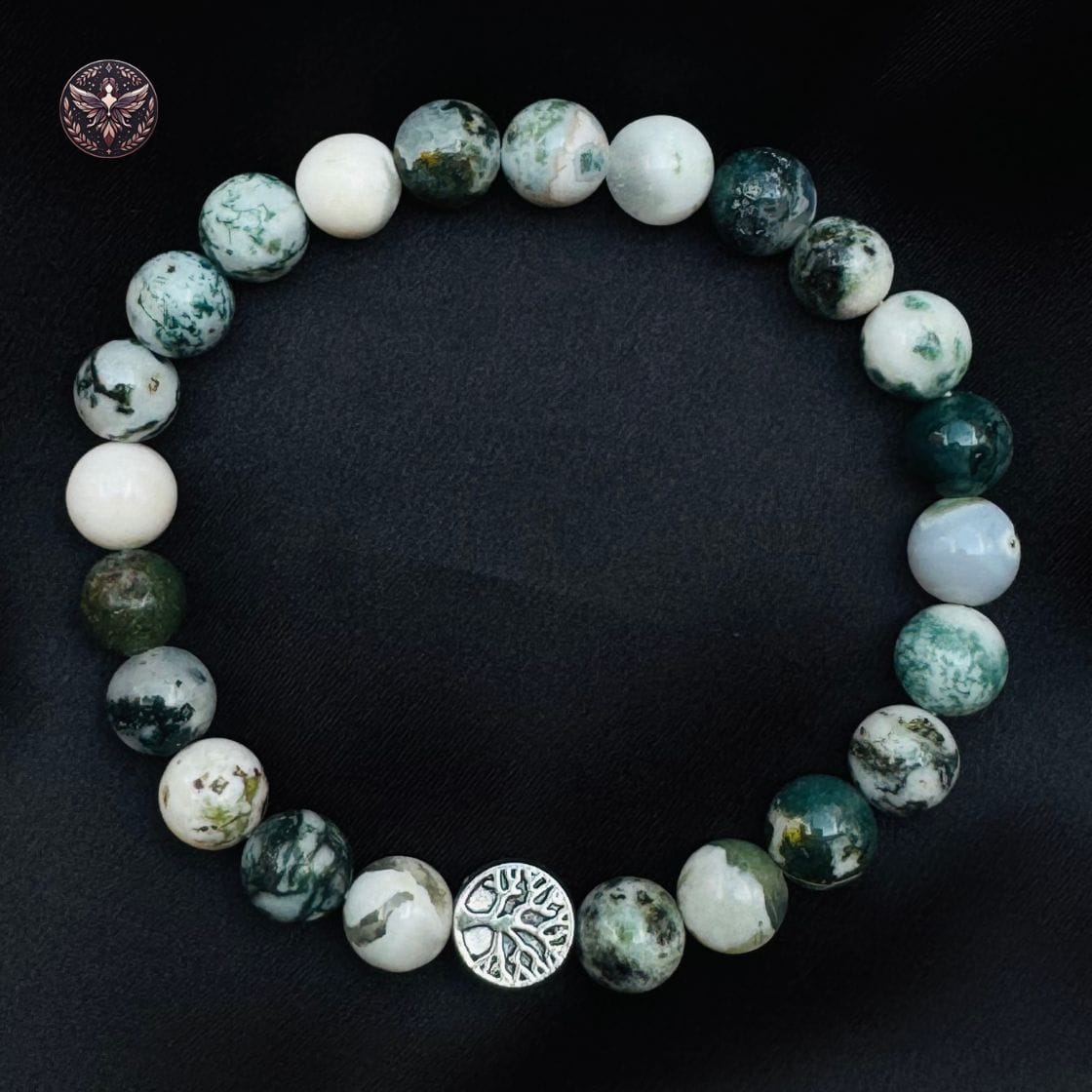 Top view of Tree Agate crystal bracelet arranged in a circle
