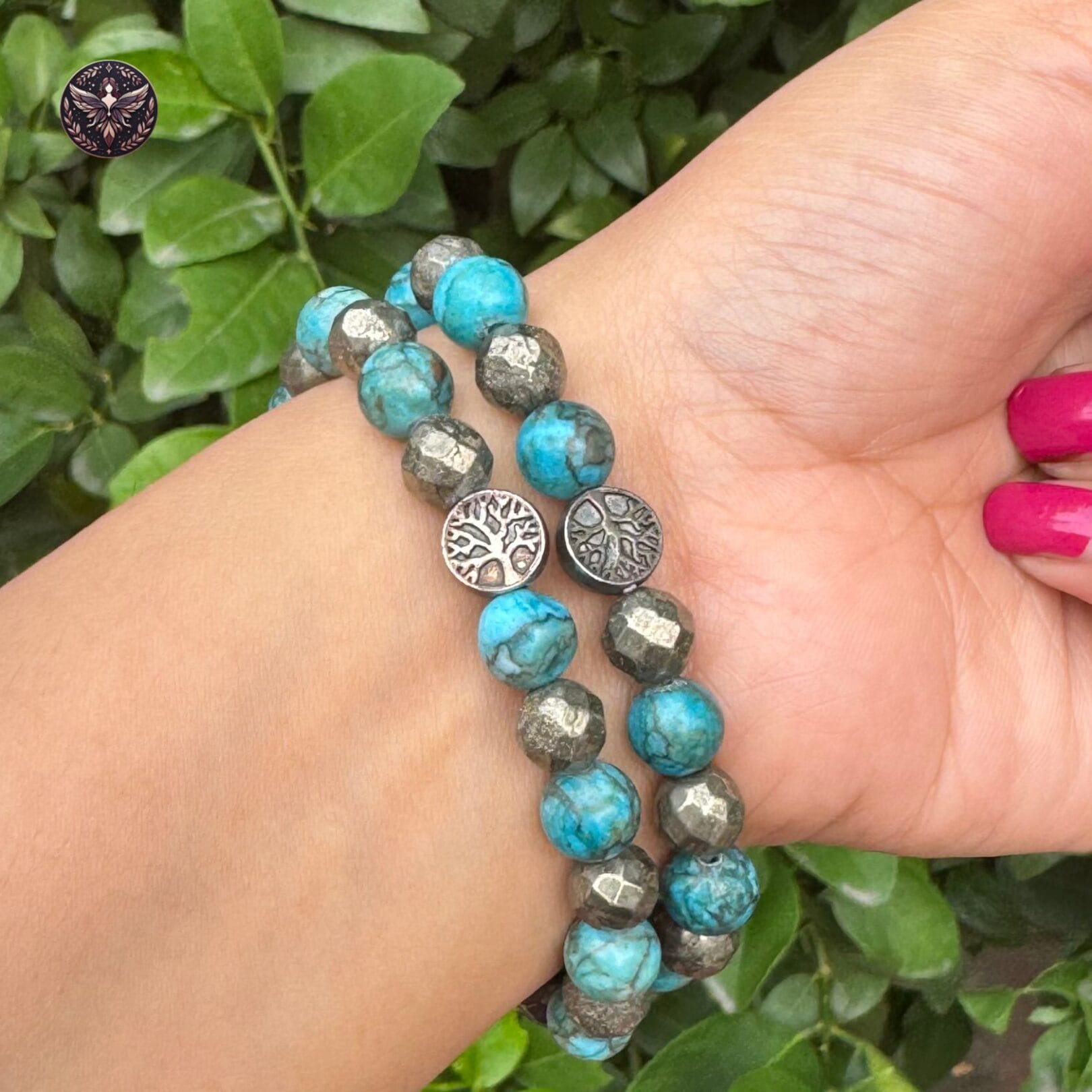 Pyrite and Turquoise Opportunity Magnet Bracelet worn on wrist with Tree of Life charm